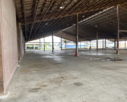 At Northwest corner of covered building looking East