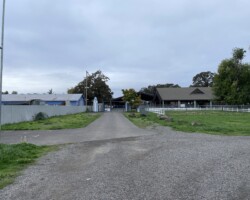 Outside blue gate looking west